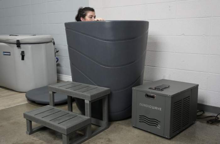 Woman in NordicWave Viking Cold plunge tub